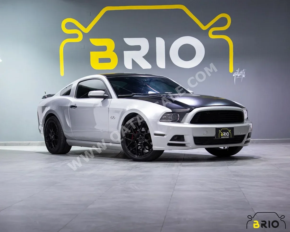 Ford  Mustang  GT  2014  Automatic  138,000 Km  8 Cylinder  Rear Wheel Drive (RWD)  Coupe / Sport  Silver