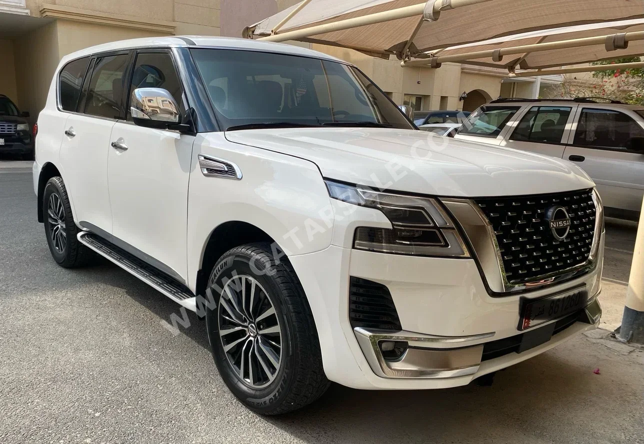 Nissan  Patrol  SE  2015  Automatic  300,000 Km  8 Cylinder  Four Wheel Drive (4WD)  SUV  White
