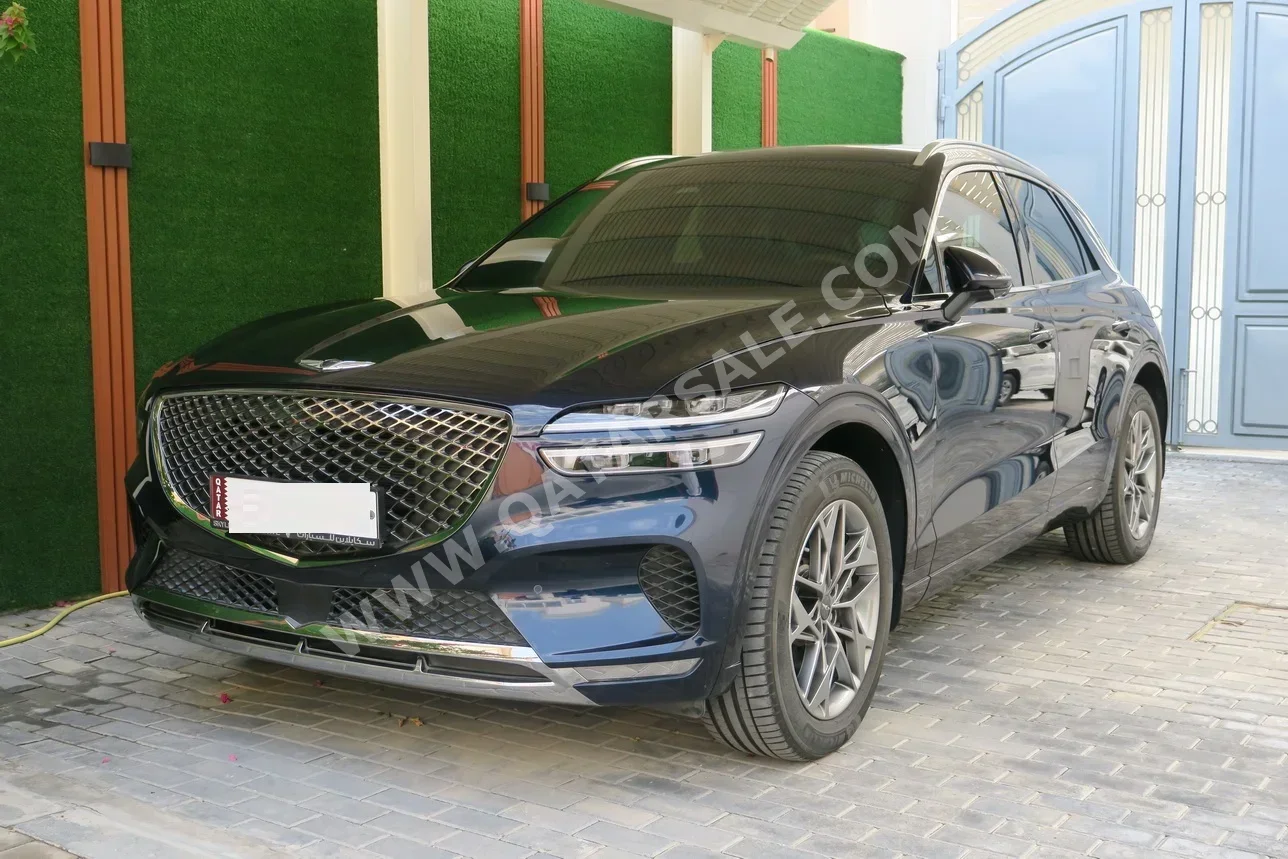 Genesis  GV 70  2024  Automatic  31,000 Km  6 Cylinder  Four Wheel Drive (4WD)  SUV  Dark Blue  With Warranty