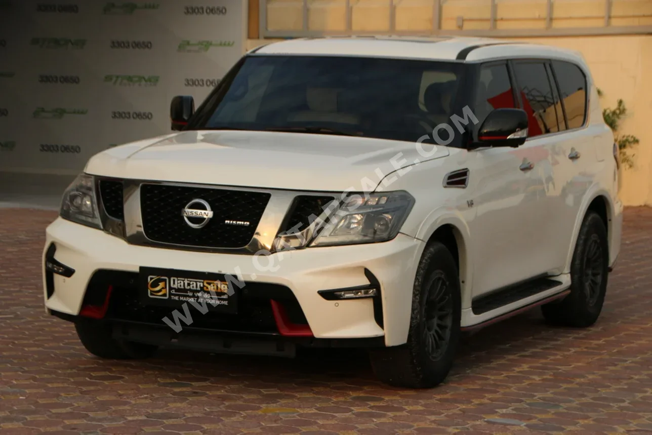 نيسان باترول نسمو 2016 اوتوماتيك 252,000 كم 8 سلندر دفع رباعي اس يو في أبيض