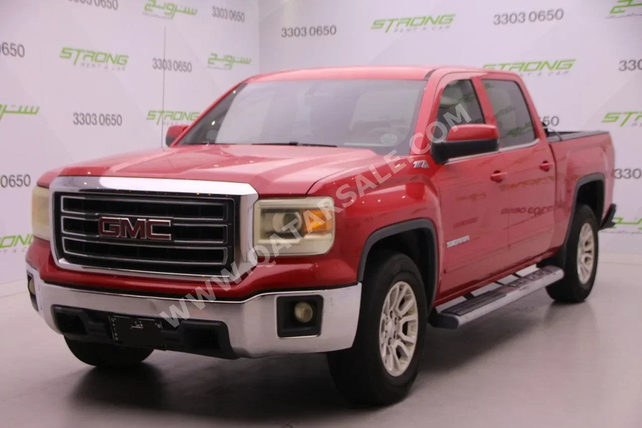 GMC  Sierra  SLE  2014  Automatic  290,000 Km  8 Cylinder  Four Wheel Drive (4WD)  Pick Up  Red
