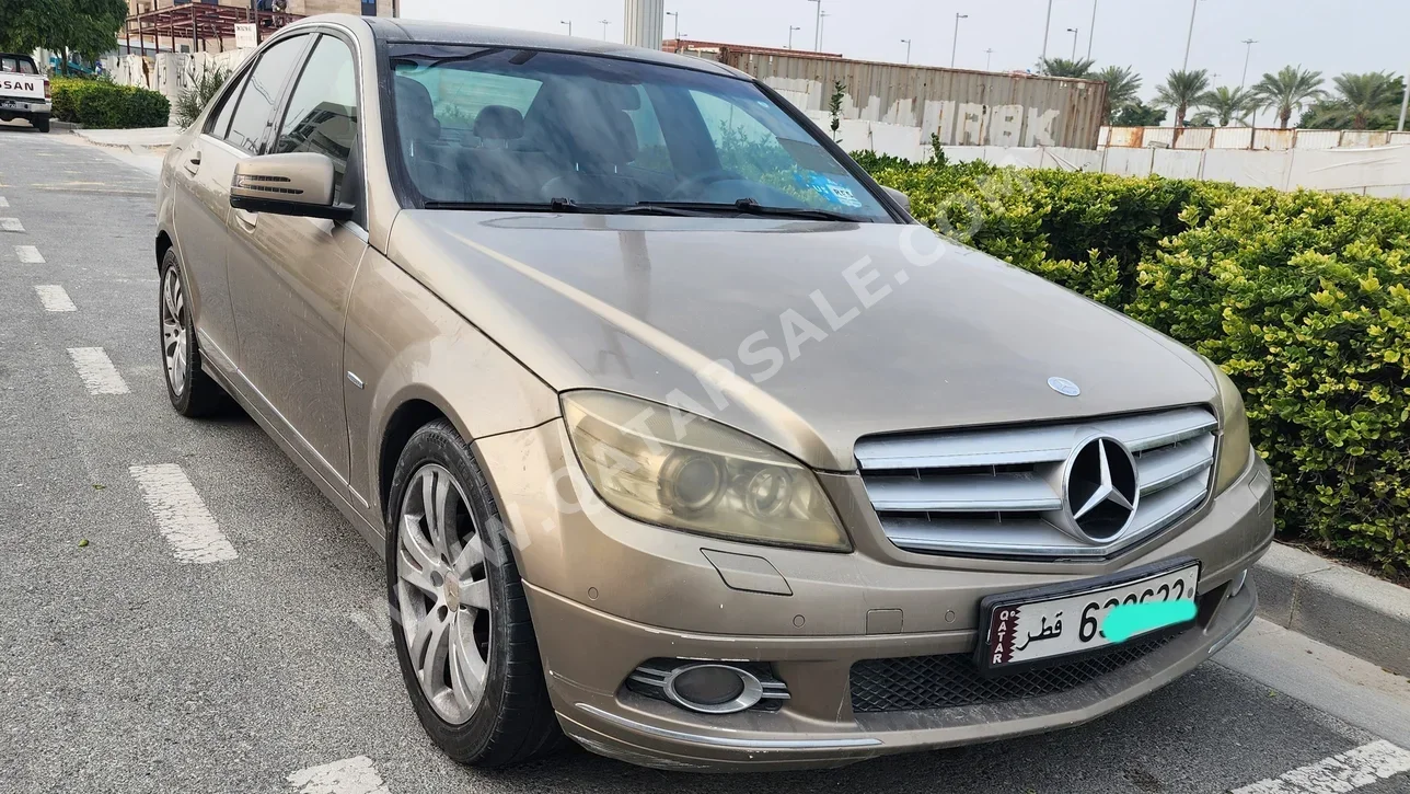 Mercedes-Benz  250 CE  2010  Automatic  233,630 Km  4 Cylinder  Sedan  Beige