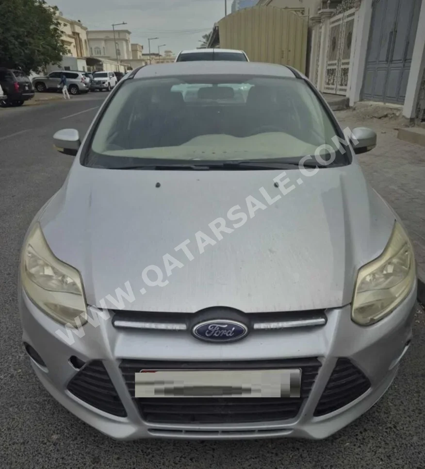 Ford  Focus  2013  Automatic  138,000 Km  4 Cylinder  Front Wheel Drive (FWD)  Hatchback  Gray