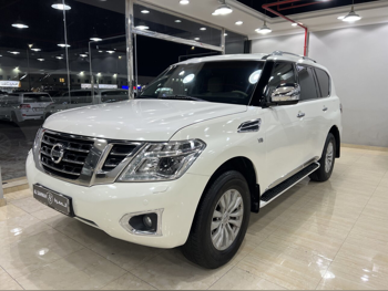 Nissan  Patrol  SE  2015  Automatic  218,000 Km  8 Cylinder  Four Wheel Drive (4WD)  SUV  White