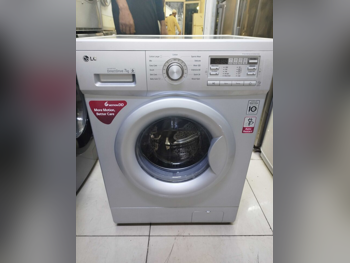 غسالة ملابس & الكل في واحد ال جي \  غسالة تحميل أمامي
