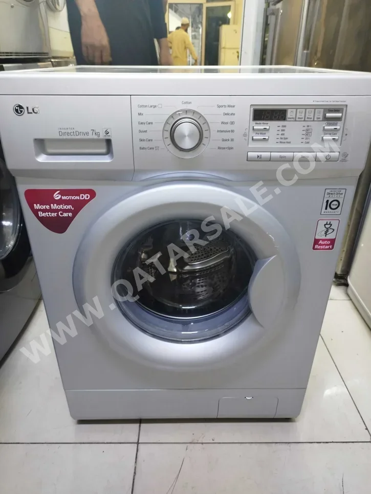 غسالة ملابس & الكل في واحد ال جي \  غسالة تحميل أمامي