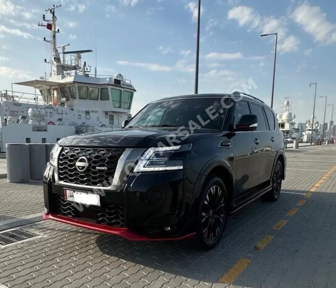 نيسان باترول نسمو 2015 اوتوماتيك 260,000 كم 8 سلندر دفع رباعي اس يو في أسود