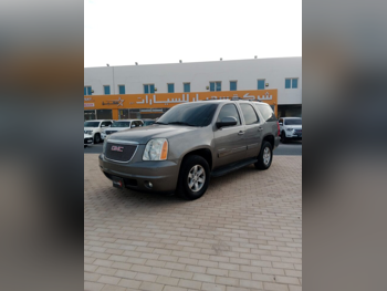 GMC  Yukon  SLE  2012  Automatic  185,000 Km  8 Cylinder  Four Wheel Drive (4WD)  SUV  Gray