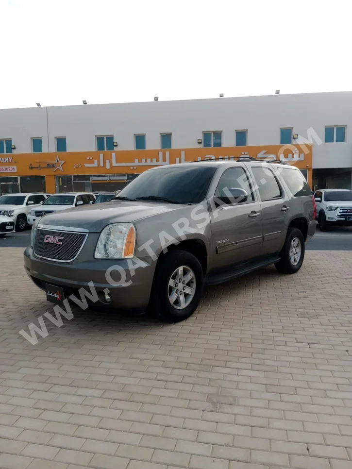 GMC  Yukon  SLE  2012  Automatic  185,000 Km  8 Cylinder  Four Wheel Drive (4WD)  SUV  Gray