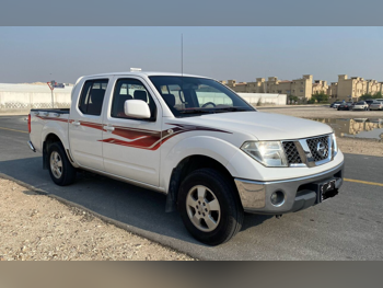 Nissan  Navara  2016  Manual  155,000 Km  4 Cylinder  Rear Wheel Drive (RWD)  Pick Up  White