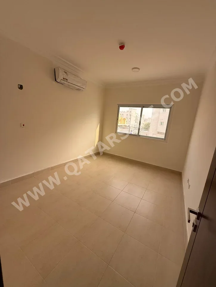 2 Bedrooms  Apartment  For Rent  in Doha -  Old Airport  Not Furnished