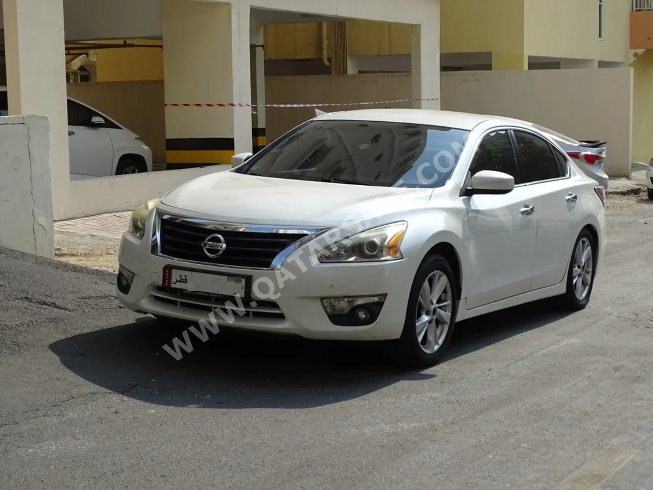 نيسان  ألتيما  2.5 اس في  2014  اوتوماتيك  88,000 كم  4 سلندر  دفع خلفي  سيدان  أبيض