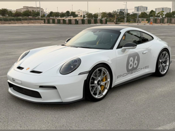 بورش  911  جي تي 3 تورينغ  2023  عادي  11,000 كم  6 سلندر  دفع خلفي  كوبيه \ سبورت  أبيض  تحت الضمان
