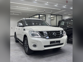 Nissan Patrol Platinum 2014 Automatic 358,000 Km 8 Cylinder Four Wheel Drive (4WD) SUV White