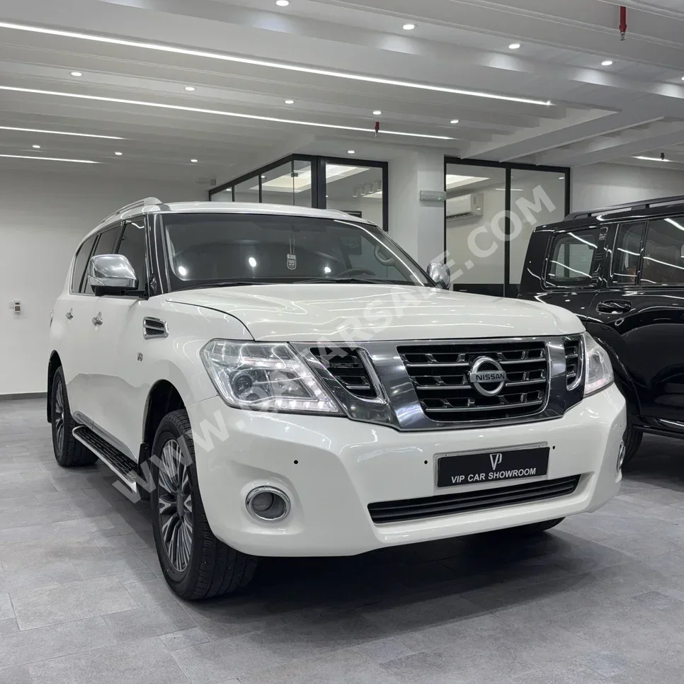 Nissan  Patrol  Platinum  2014  Automatic  358,000 Km  8 Cylinder  Four Wheel Drive (4WD)  SUV  White