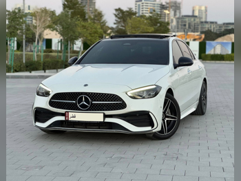 Mercedes-Benz  C-Class  200 AMG  2023  Automatic  31,000 Km  4 Cylinder  Rear Wheel Drive (RWD)  Sedan  White