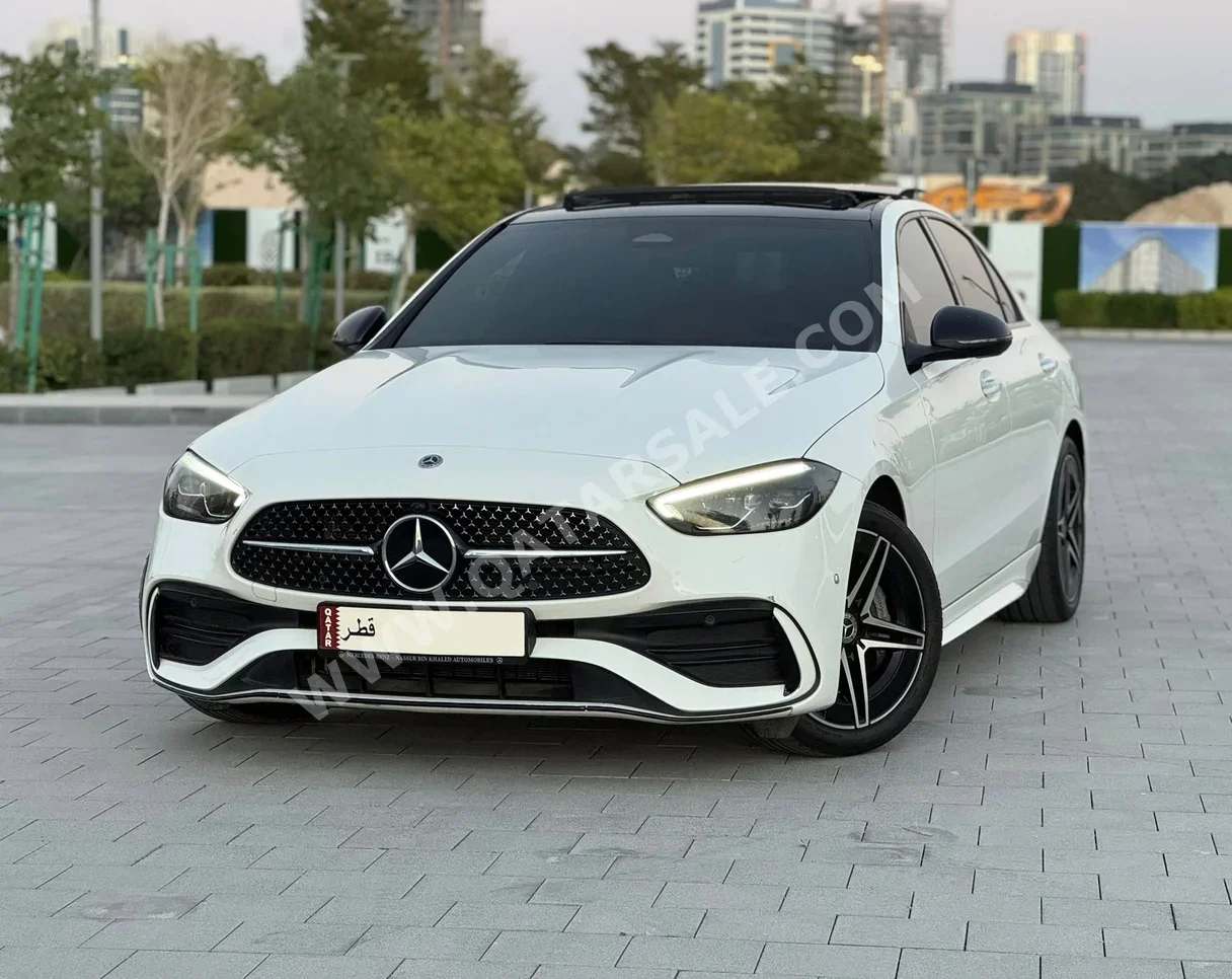 Mercedes-Benz  C-Class  200 AMG  2023  Automatic  31,000 Km  4 Cylinder  Rear Wheel Drive (RWD)  Sedan  White