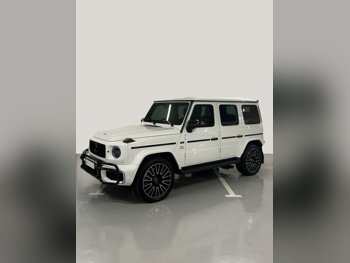 مرسيدس - بنز  جي - كلاس  63 اي ام جي  2025  اوتوماتيك  6,000 كم  8 سلندر  دفع رباعي  اس يو في  أبيض  تحت الضمان