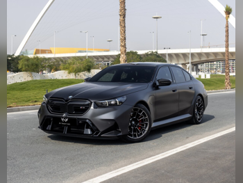 BMW  M-Series  5  2025  Automatic  28,000 Km  8 Cylinder  Rear Wheel Drive (RWD)  Sedan  Gray  With Warranty