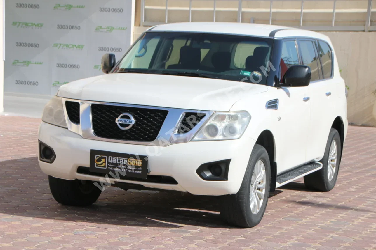 Nissan  Patrol  XE  2015  Automatic  449,000 Km  8 Cylinder  Four Wheel Drive (4WD)  SUV  White