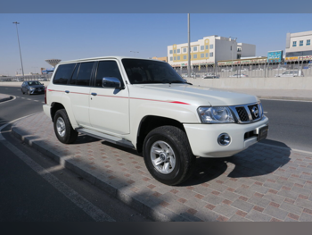 نيسان  باترول  سفاري  2023  عادي  62,000 كم  6 سلندر  دفع رباعي  اس يو في  أبيض  تحت الضمان