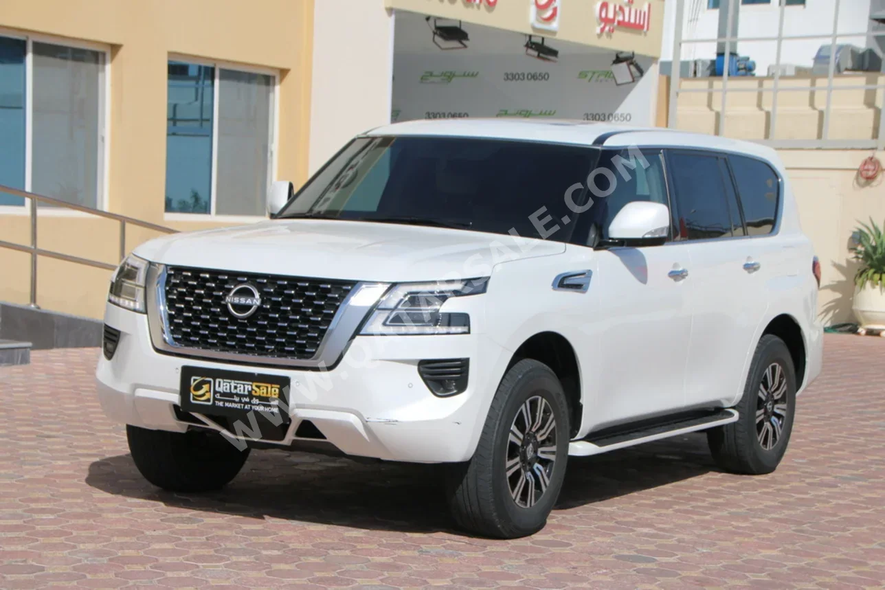 Nissan  Patrol  SE  2022  Automatic  100,000 Km  6 Cylinder  Four Wheel Drive (4WD)  SUV  White