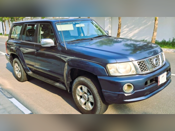 Nissan  Patrol  Super Safari  2005  Automatic  310,000 Km  6 Cylinder  Four Wheel Drive (4WD)  SUV  Dark Blue