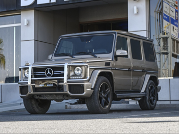 مرسيدس - بنز  جي - كلاس  63 اي ام جي  2014  اوتوماتيك  137,000 كم  8 سلندر  دفع رباعي  اس يو في  ذهبي