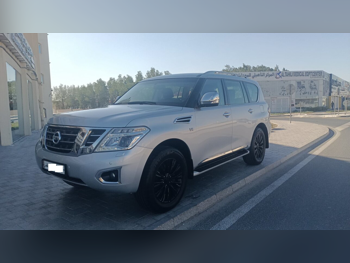 Nissan  Patrol  SE  2015  Automatic  281,000 Km  8 Cylinder  Four Wheel Drive (4WD)  SUV  Silver