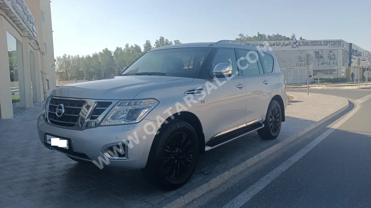 Nissan  Patrol  SE  2015  Automatic  281,000 Km  8 Cylinder  Four Wheel Drive (4WD)  SUV  Silver