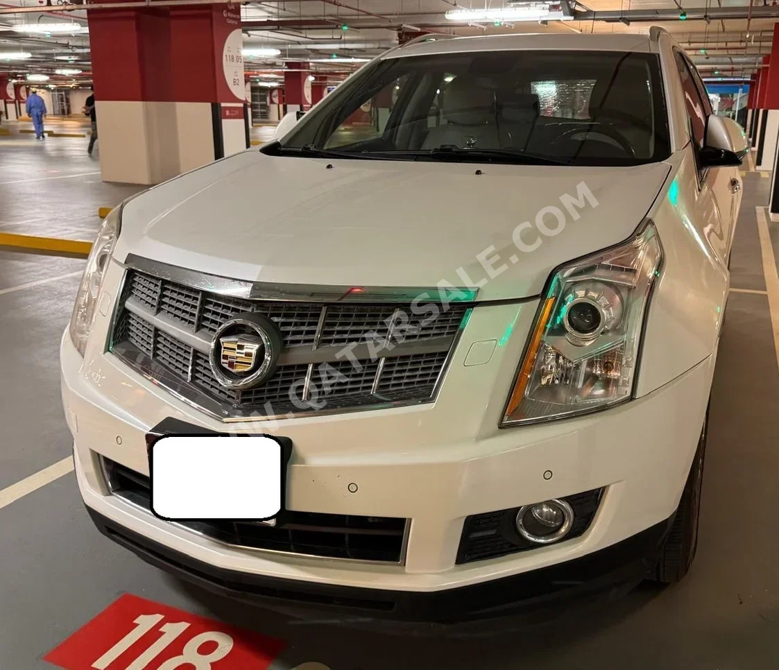 Cadillac  SRX  4  2010  Automatic  149,000 Km  6 Cylinder  Four Wheel Drive (4WD)  SUV  White