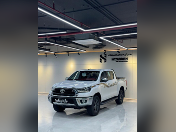 تويوتا  هاي لوكس  اس ار 5  2024  اوتوماتيك  12,000 كم  4 سلندر  دفع رباعي  بيكب  أبيض  تحت الضمان