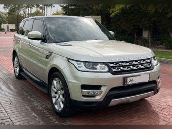Land Rover  Range Rover  Sport HSE  2015  Automatic  166,000 Km  6 Cylinder  Four Wheel Drive (4WD)  SUV  Gold