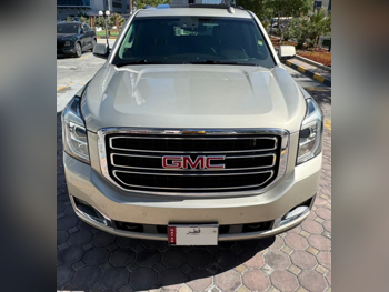 GMC  Yukon  SLT  2015  Automatic  126,800 Km  8 Cylinder  Four Wheel Drive (4WD)  SUV  Gold