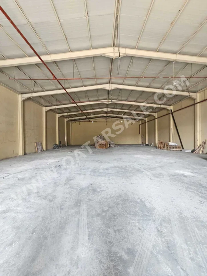 مخازن و مستودعات - الريان  - المنطقة الصناعية  -المساحة: 600 متر مربع