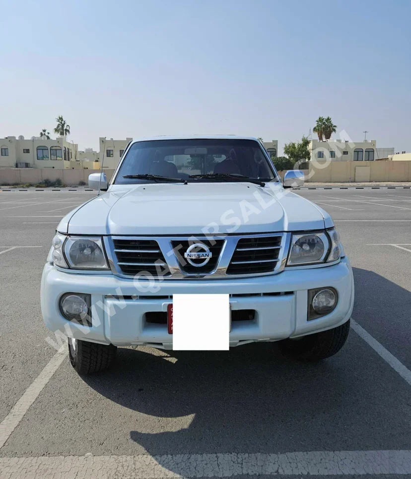 نيسان  باترول  سفاري  2002  اوتوماتيك  333,000 كم  6 سلندر  دفع رباعي  اس يو في  أبيض
