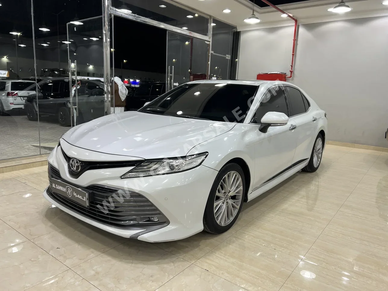 Toyota  Camry  Limited  2019  Automatic  176,000 Km  6 Cylinder  Front Wheel Drive (FWD)  Sedan  White