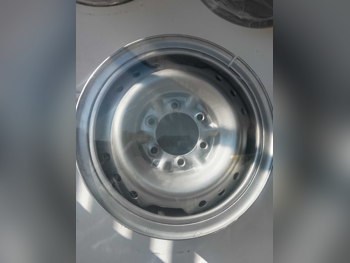 رنقات العجلات نيسان  صلب \  16 بوصة  فضي  4  5