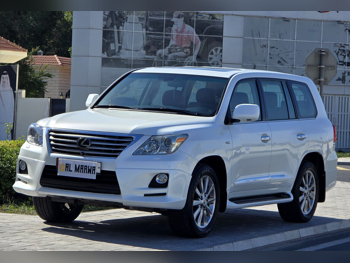 Lexus  LX  570 S  2011  Automatic  124,000 Km  8 Cylinder  Four Wheel Drive (4WD)  SUV  White