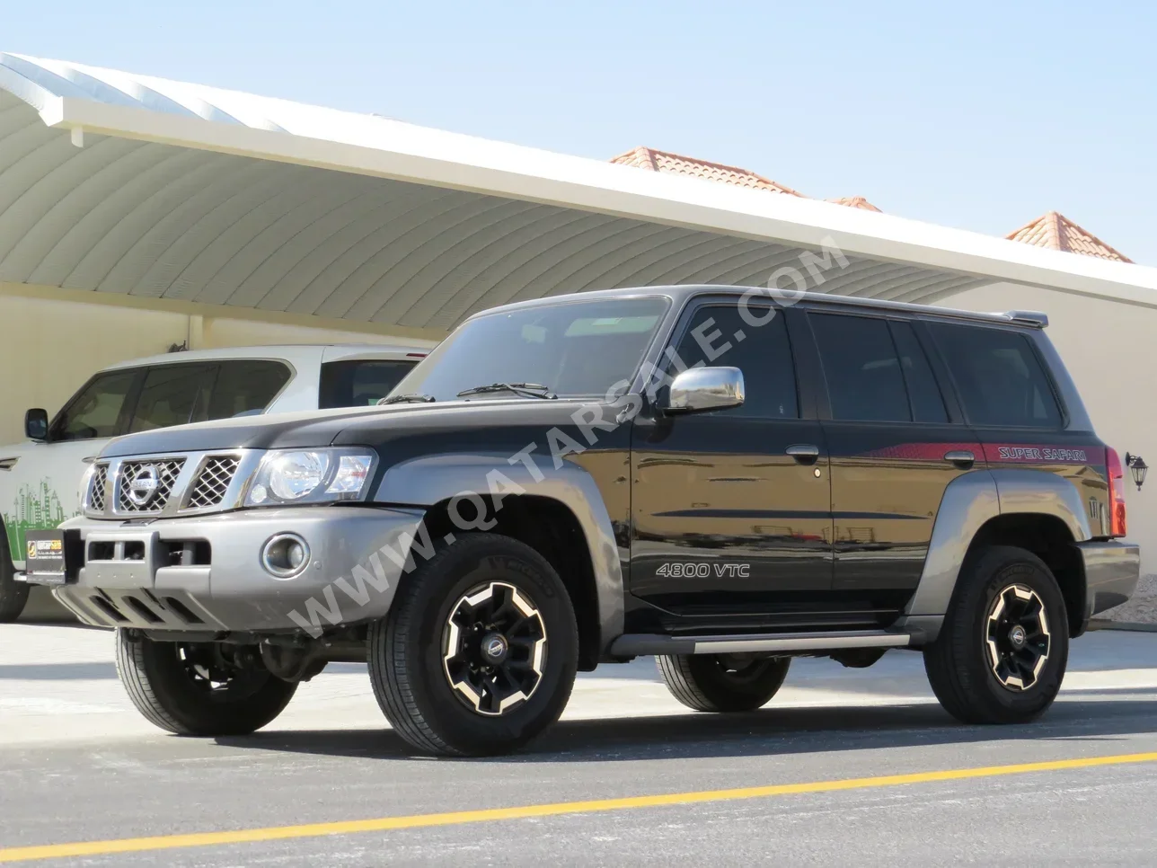 Nissan  Patrol  Super Safari  2022  Automatic  29,500 Km  6 Cylinder  Four Wheel Drive (4WD)  SUV  Black and Gray