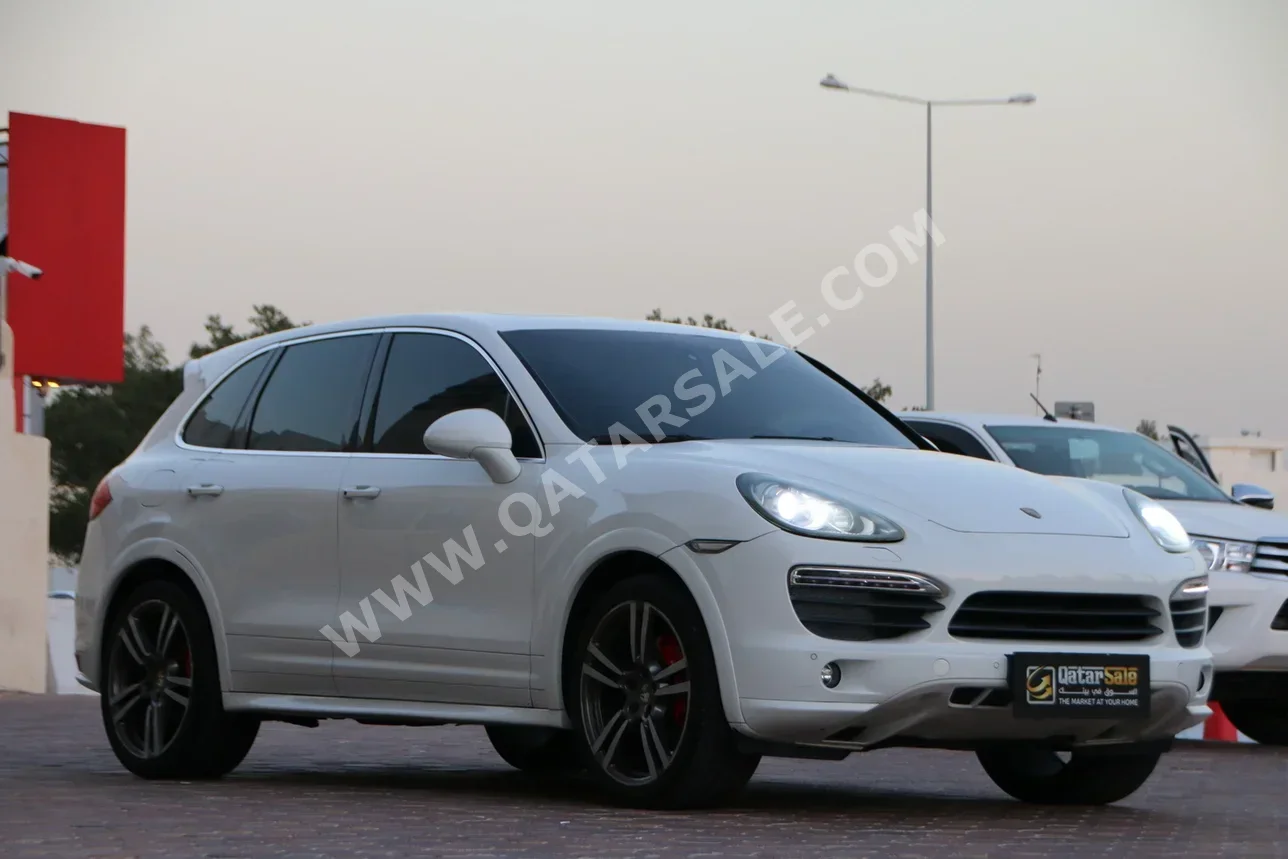 بورش كيان اس 2012 اوتوماتيك 185,000 كم 8 سلندر دفع رباعي اس يو في أبيض