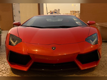 Lamborghini  Aventador  2013  Automatic  33,600 Km  12 Cylinder  All Wheel Drive (AWD)  Coupe / Sport  Orange
