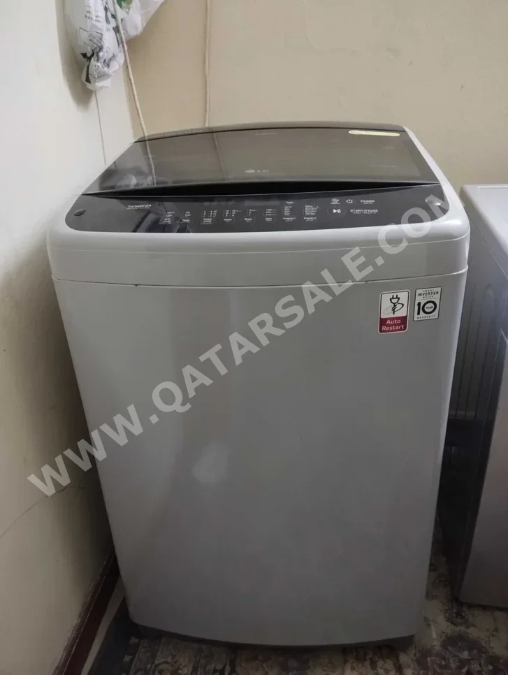 غسالة ملابس & الكل في واحد ال جي \  غسالة تحميل علوي  فضة