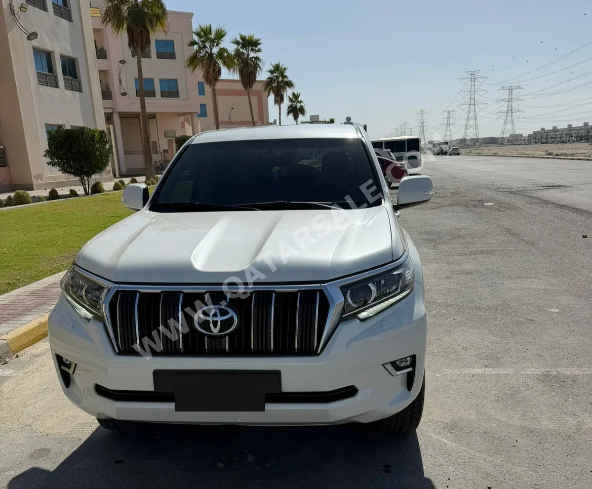 تويوتا  برادو  تي اكس ال  2021  اوتوماتيك  139,000 كم  6 سلندر  دفع رباعي  اس يو في  أبيض