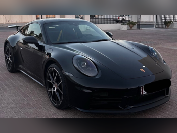 Porsche  911  Carrera  2025  Automatic  6,500 Km  6 Cylinder  Rear Wheel Drive (RWD)  Coupe / Sport  Black  With Warranty