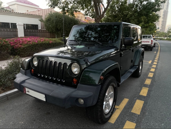 Jeep  Wrangler  Sahara  2011  Automatic  179,000 Km  6 Cylinder  Four Wheel Drive (4WD)  SUV  Olive Green