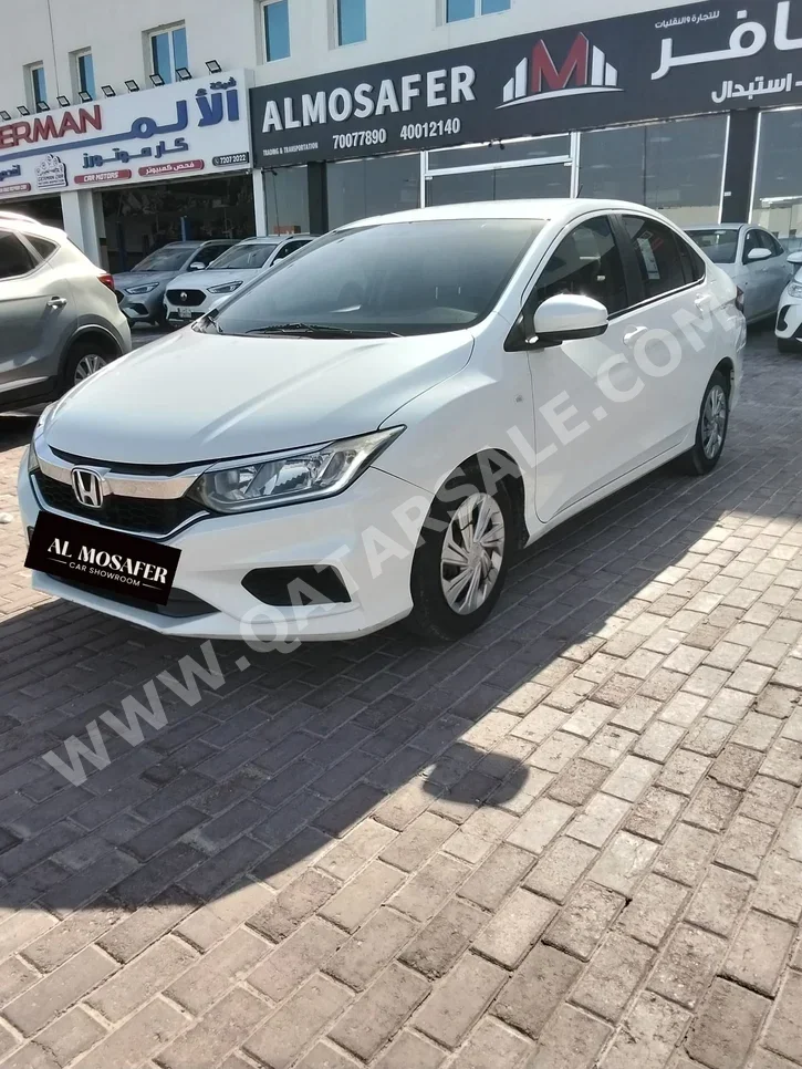 Honda  City  2020  Automatic  130,000 Km  4 Cylinder  Front Wheel Drive (FWD)  Sedan  White