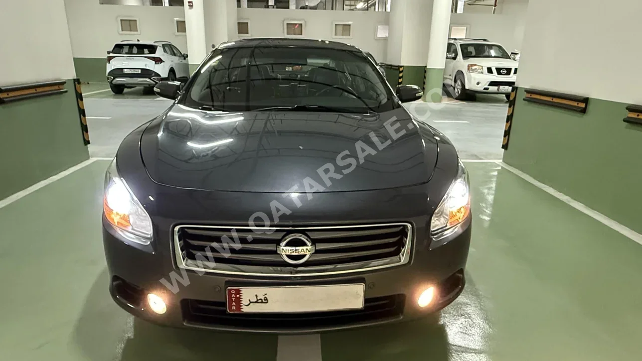Nissan  Maxima  SR  2013  Automatic  148,000 Km  6 Cylinder  Front Wheel Drive (FWD)  Sedan  Gray Metallic