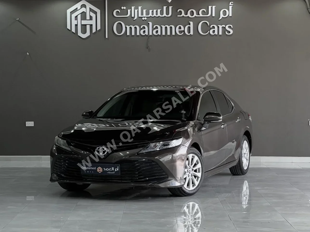 Toyota  Camry  GLE  2019  Automatic  164,000 Km  4 Cylinder  Front Wheel Drive (FWD)  Sedan  Brown