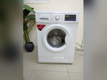 Washing Machines & All in ones LG /  Top Load Washer  White